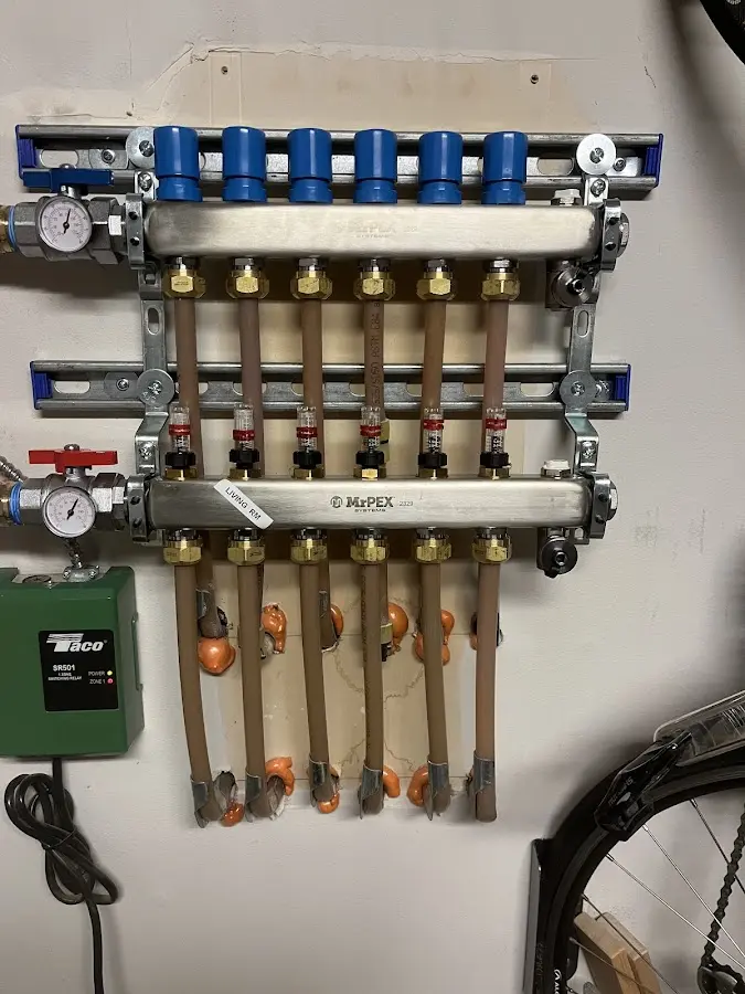 Plumber performing Water Heater Repair at a residential property in Mount Oliver